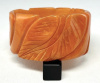 BB419 wide leaf carved apricot bakelite bangle